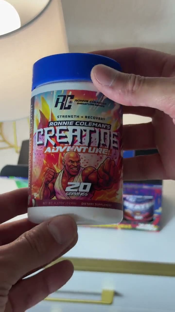Load video: Creator unboxes the Creatine Adventure box set and holds up the DragonFruit Splash tub